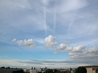 Cumulus sous un voile de cirrostratus